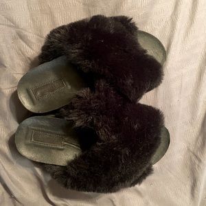 Black fuzzy slippers. Indoor/outdoor!